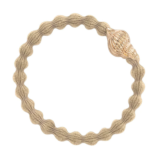 Le bracelet élastique avec sujet doré